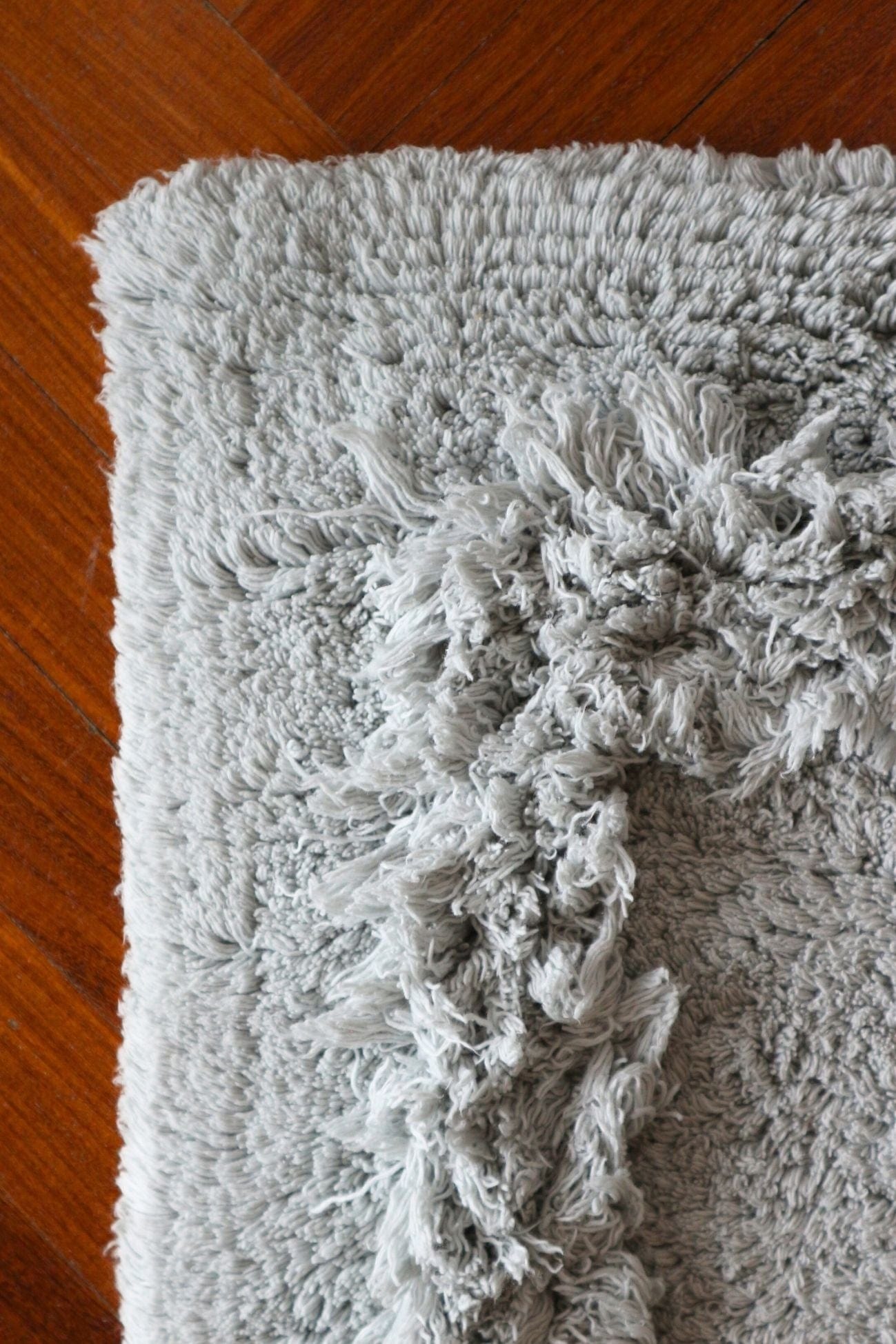 Blanc MariClo' Phoebe Phoebe - Phoebe - Tappeto in cotone con doppia cornice azzurro 90x60 | Blanc MariClo'