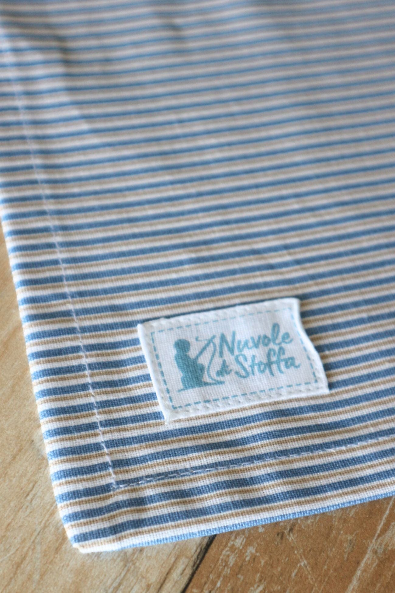 Nuvole di Stoffa Glauco Glauco - Tovaglietta a forma di conchiglia bianca e azzurra | Nuvole di Stoffa